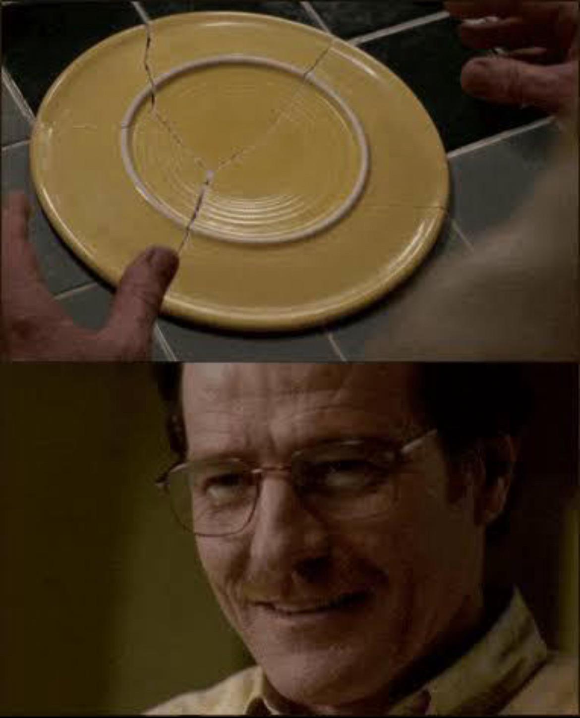 the broken plate from breaking bad but all pieces are there. walter is smiling.
